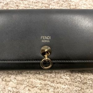 Fendi clutch purse with removable gold chain.
